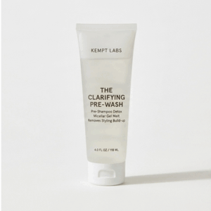 A frosted squeeze tube of KEMPT Labs The Clarifying Pre-Wash gel on a clean, light studio background.